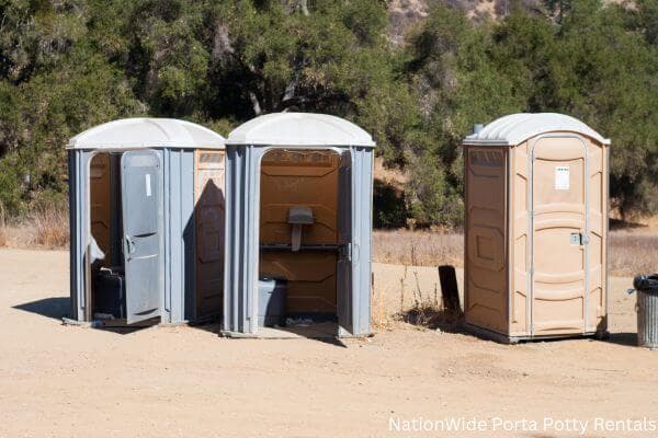 a clean row of portable restrooms for outdoor weddings or festivals in Exeter, RI